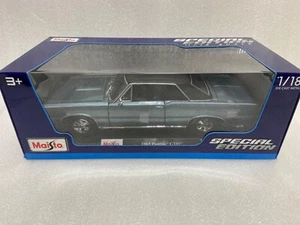 NIB 1:18 1965 Pontiac GTO - Picture 1 of 8