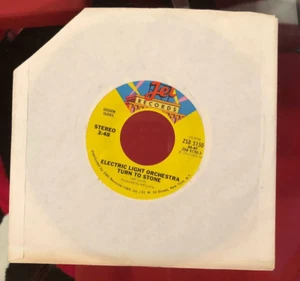 ELECTRIC LIGHT ORCHESTRA TURN TO STONE/SWEET TALKIN' WOMAN 45 VINYL - Foto 1 di 3