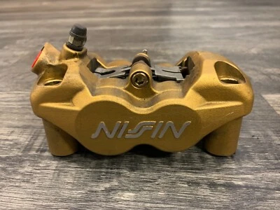 Pinza de freno delantera izquierda Triumph Daytona 675 Street Triple R OEM Nisin T2020357  Foto 1 de 4