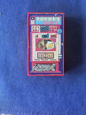 Juego de máquina tragamonedas Tomy Pocket vintage, en estado de funcionamiento Foto 1 de 4
