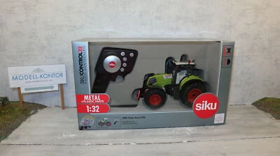 Siku 6882 in 1:32,  Claas Axion 850 Control mit Pistolen-FB, NEU in OVP - Bild 1 von 3
