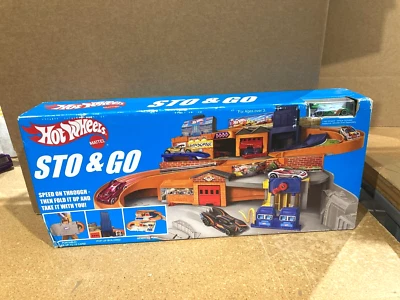 Hot Wheels Service Station Sto & Go FOLDS UP DMW90 Includes Car-Dented Box* - Image 1 of 2