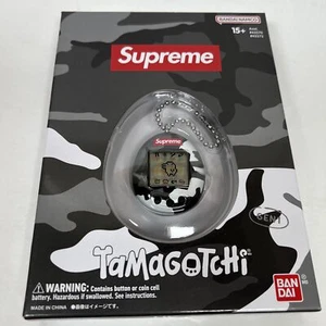 Supreme Bandai Namco Tamagotchi Negro (PS23) - Nuevo - Sellado - Imagen 1 de 8