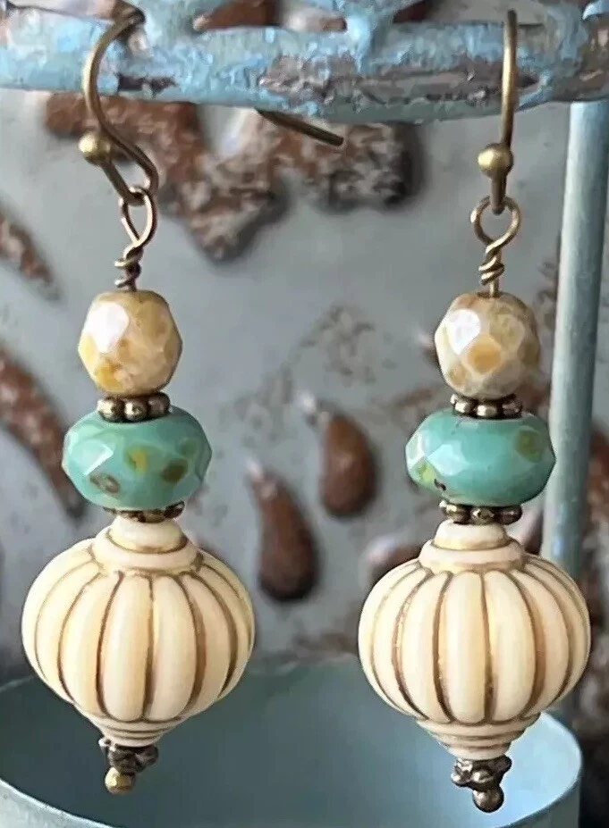 Bronze, Ivory and Turquoise Picasso Bead Earrings. - Image 1 of 1
