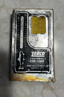 Placa de trucha Zebco De-Liar #228 escala y cinta métrica con caja USADA LEER DE COLECCIÓN Foto 1 de 4