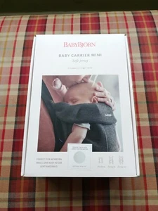 Baby Bjorn Babytrage Mini - hellbeige Jersey, originalverpackt, super Zustand - Bild 1 von 10