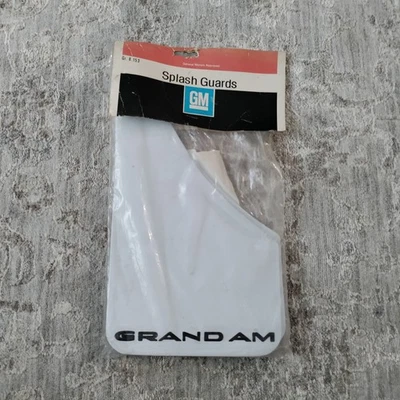 Nos GM splash guards Mud Flaps Pontiac Grand Am White w/black letters 999194 - Image 1 of 4