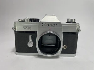 Canon TX 35mm fotocamera reflex pellicola solo corpo non testata - Foto 1 di 13