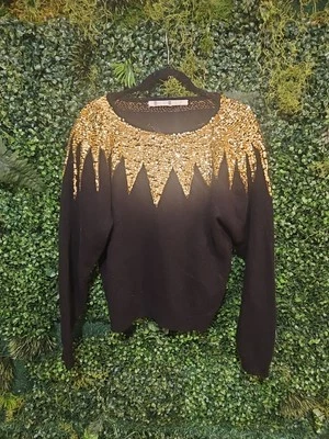 Suéter negro manga larga vintage de lentejuelas doradas para mujer Foto 1 de 4