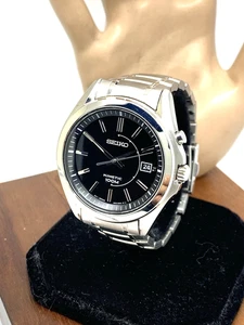 Reloj para hombre Seiko SKA523 cinético esfera negra fecha plata acero inoxidable 40 mm - Imagen 1 de 13