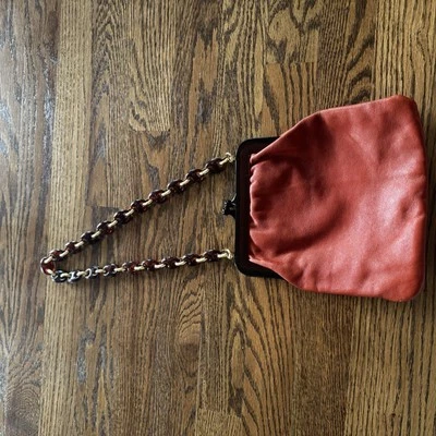 Cartera de mano vintage borgoña naranja plástico tortuga Italia correa de bloqueo KISS Foto 1 de 4