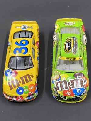 1/64 Kyle Busch #18 M&M'S CHAMPION 2015 CAMRY LIMITED EDITION NEW & #36 M&M 2004 - Image 1 of 4