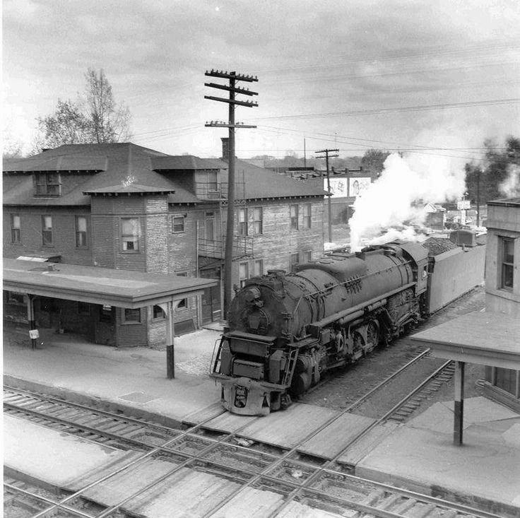 A PRR J1 crosses over the Erie Railroad at AC Tower in Marion, Ohio 8.5x11 - Image 1 of 1