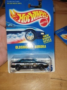 1992 Vintage Hot Wheels Oldsmobile Aurora Police Car On Blue & White Card #265 - Picture 1 of 7