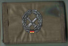Bundeswehra: Portfel: Artyleria Odznaka beretowa oliwkowa 1 sztuka