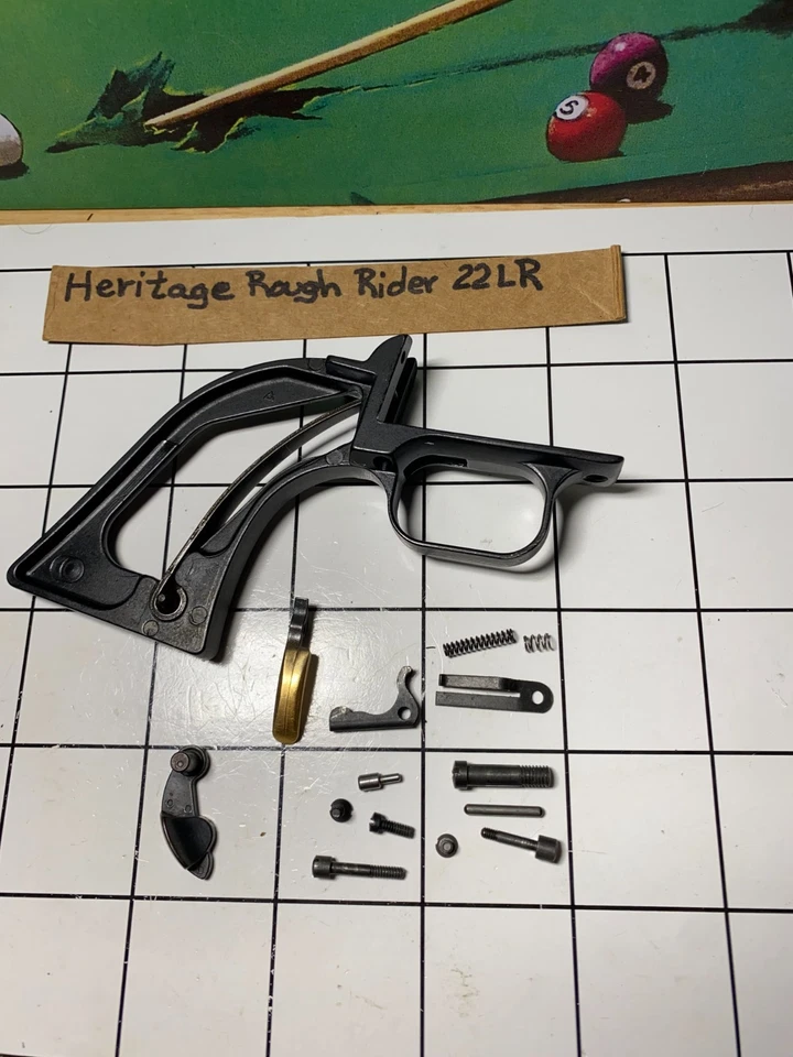 Heritage Rough Rider .22 LR.Back strap . Gold-plated trigger.& more repair parts - Image 1 of 4