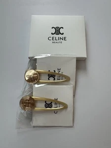 Juego de 2 horquillas para monedas de oro Celine de 2 accesorios para el cabello estilo logotipo usado - Imagen 1 de 2