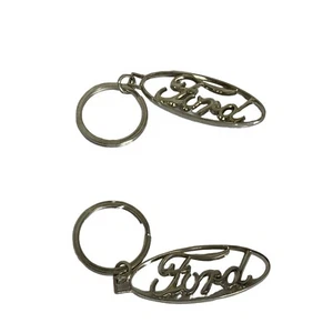 New Ford Oval Chrome Key Chain Lot of 2 Cut Out Script Ford Logo Silver - Picture 1 of 3