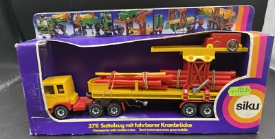 Siku 37711 Transporter W/ Mobile Crane MAN Diesel LS-W28 In box - Ripped Plastic - Image 1 of 4