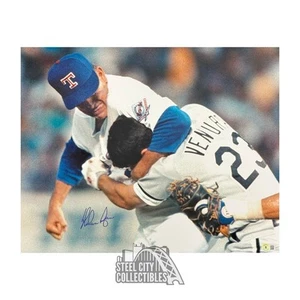 Nolan Ryan Autographed Texas 16x20 Baseball Photo - BAS (Fighting) - Picture 1 of 1