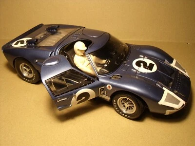 1/18  FIGURE  KEN  MILES  DRIVING  VROOM  EXOTO  FORD MK II  SHELBY COLLECTIBLES - Image 1 of 4