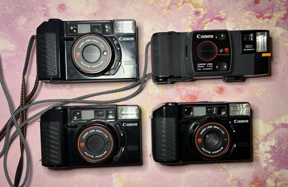 Lot of 4  - Canon 35mm Film Cameras -  Autoboy, Snappy - PARTS ONLY AS IS - Image 1 of 1