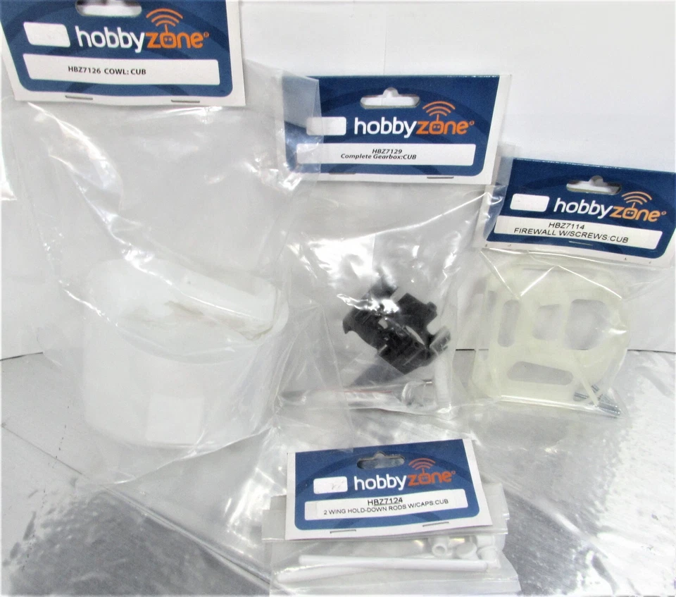 HobbyZone Cub Parts lot Cowl, Firewall w/Screws, Complete Gearbox, & hold down - Image 1 of 4