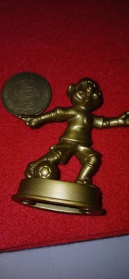 Figura dorada vintage Chuck E. Cheese 2010 con ficha 1997 Foto 1 de 4