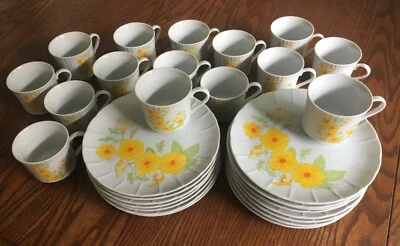 Vintage White Porcelain Dinnerware with Yellow Floral Print Pattern - Image 1 of 4