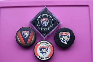 Florida Panthers NHL lizenziertes Souvenir- und Spielpuck-Set (insgesamt vier Pucks) - Bild 1 von 5