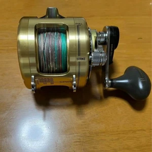 Moulinet double axe Shimano Tiagra 12 doré occasion du Japon - Photo 1/4