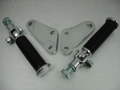 SOPORTE CLAVIJA PIE PASAJERO HARLEY CABEZA DE PALA BRAZO OSCILANTE EXTREMO CROMADO NEGRO  Foto 1 de 4