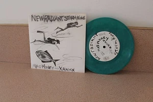 New Radiant Storm King Mad Money and Xanax 7" green vinyl  - Foto 1 di 1