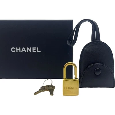 Authentic CHANEL Crochet PadLock & 2Keys Gold Metallic #36637167 - Image 1 of 4
