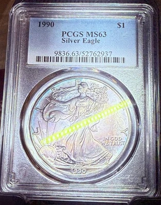 1990 Silver American Eagle PCGS MS63 Toned On Both Sides - Image 1 of 3