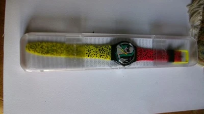 Vintage Swatch dans son boitier bracelet rouge et jaune personnage fond d'écran - Photo 1/2