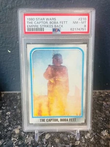 Tarjeta Empire 1980 Topps Star Wars #210 The Captor, Boba Fett PSA 8 casi nueva-como nueva - Imagen 1 de 1
