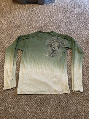 Camisa para mujer corte aflicción cuello en V pequeña manga larga AOP BIG A calavera cruz Mma Foto 1 de 4