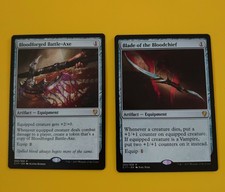 MTG Card x2. Bloodforged Battle-Axe and Blade of the Bloodchief  Commander 2017