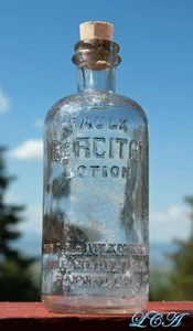 UNIQUE antique MERCITAN DENTAL bottle L.D. CAULK Co but RARE CYLINDER shape - Picture 1 of 5