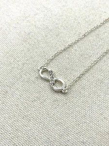 Crystal Rhinestone White Silver Tone Infinity Loop Charm Bracelet 8 Inch NWOT - Picture 1 of 21