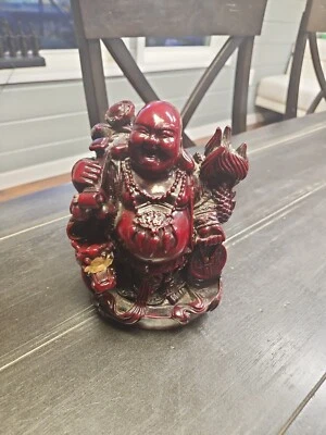 Estatuas de jade rojo Foto 1 de 4