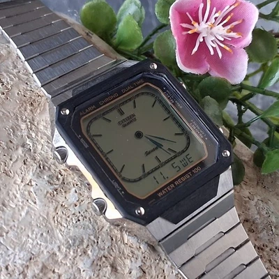 Reloj pulsera Citizen 9560 vintage para hombre con manecillas digitales reparado 1982 Foto 1 de 4