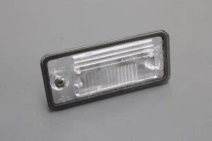 Genuine Audi A3 A4 A5 S8 Q7 RS3 RS6 number plate bulb holder (left) 8E0943021B - Picture 1 of 3