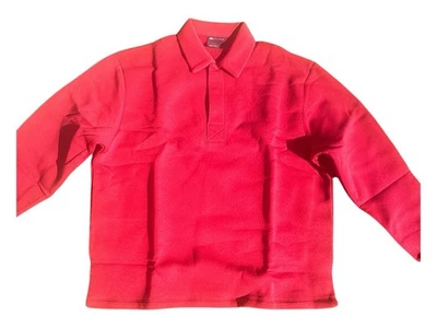 Polo relajado con botones y tapeta oculta en rojo ASOS DESIGN Foto 1 de 4