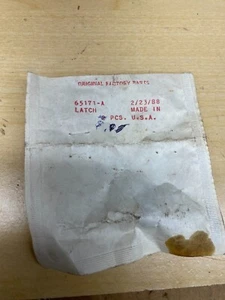 NOS Homelite Trigger Latch. Part 65171-A - Picture 1 of 2