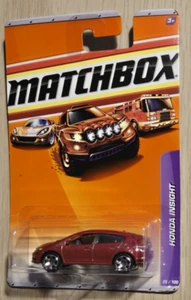 2009 Matchbox HONDA INSIGHT Red Hybrid Electric Car Metro Rides #25/100 1:64 - Bild 1 von 3