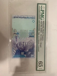 Malaysia RM1 ali center CR 7247989 very rare PMG 65 - Picture 1 of 2
