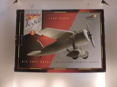 Die Cast Metal Bank: LIMITED EDITION LOOKHEED VEGA (RED)  - Image 1 of 4