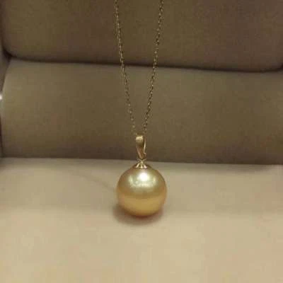 NUEVO COLGANTE de oro amarillo macizo de 18 quilates 10-11 mm AAA+ perla redonda dorada del Mar del Sur Foto 1 de 3